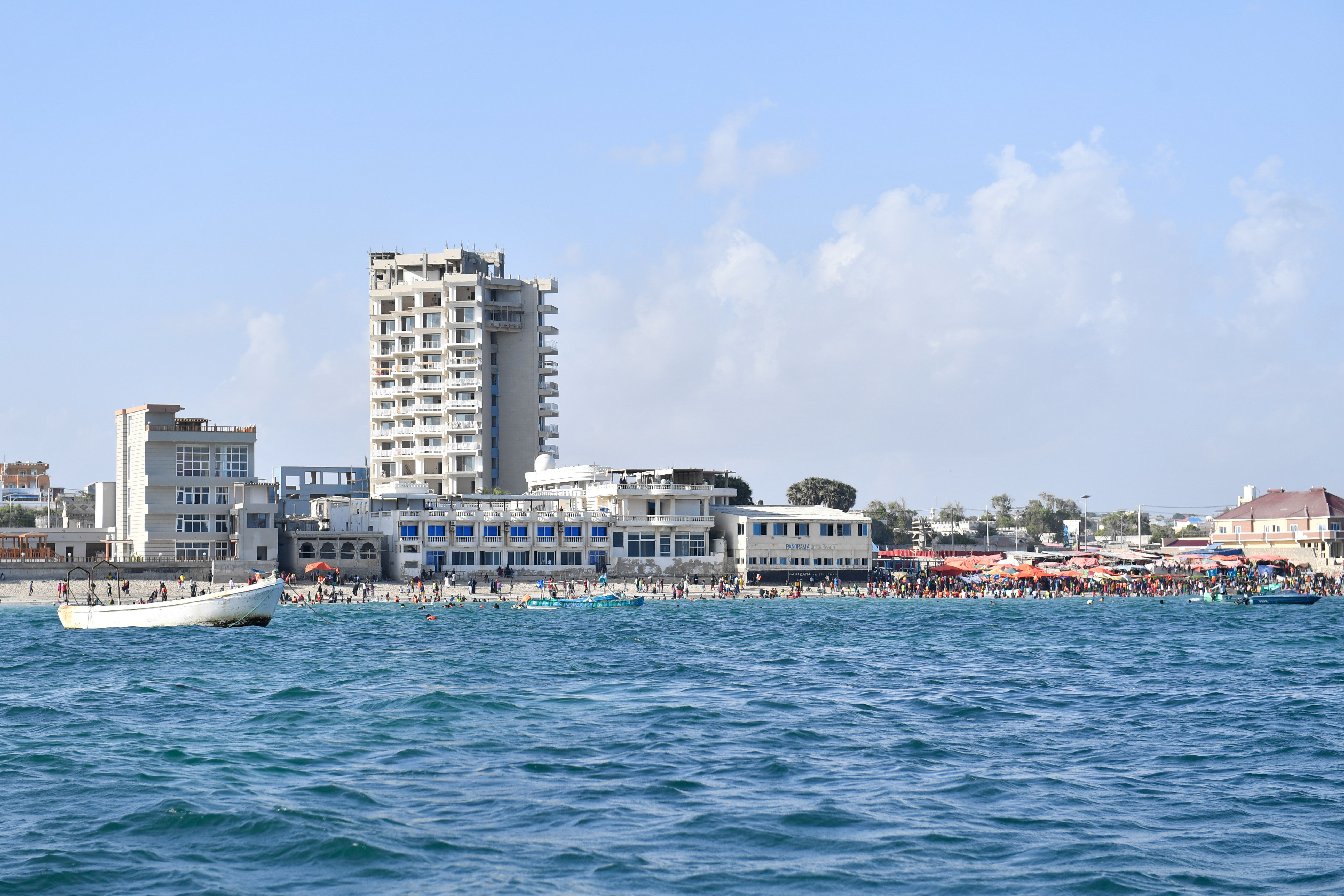 Lido beach in Mogadishu seen from the water on a clear day.